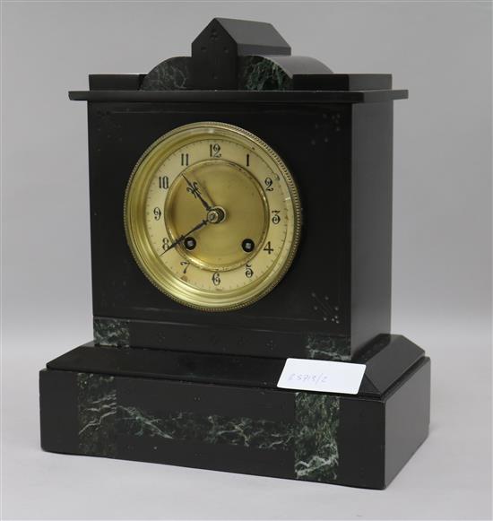 A slate mantel clock with key and pendulum height 29cm